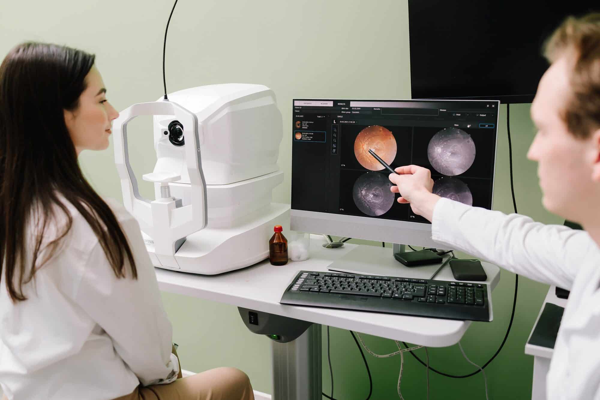 Clinicians reviewing retinal images during a diabetic eye screening